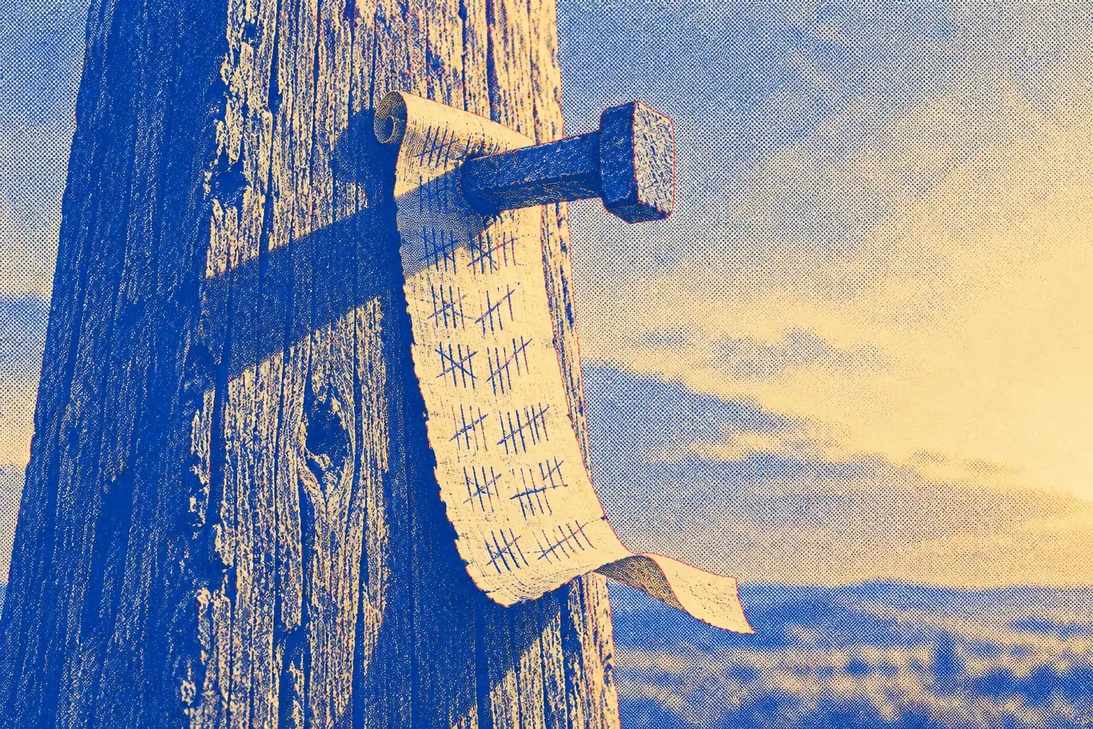 A close view of a rough wooden beam. A large iron nail pins a small strip of papyrus, marked with rows of short tally strokes, flat against the wood, and its loose end curls in the air.