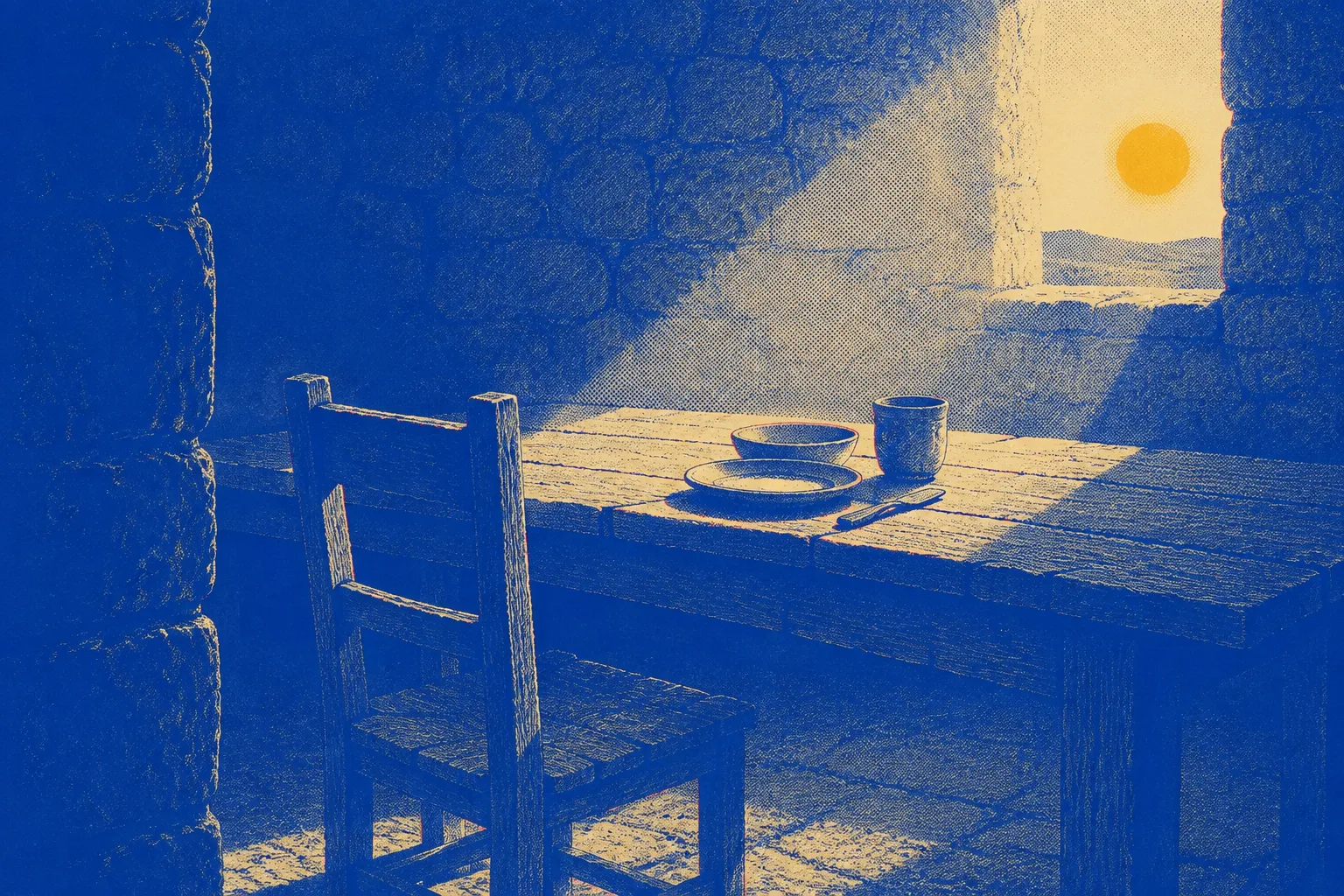 An empty chair drawn up to a long table in an otherwise still room, early morning light across the boards, a single place set and nobody yet sitting in it