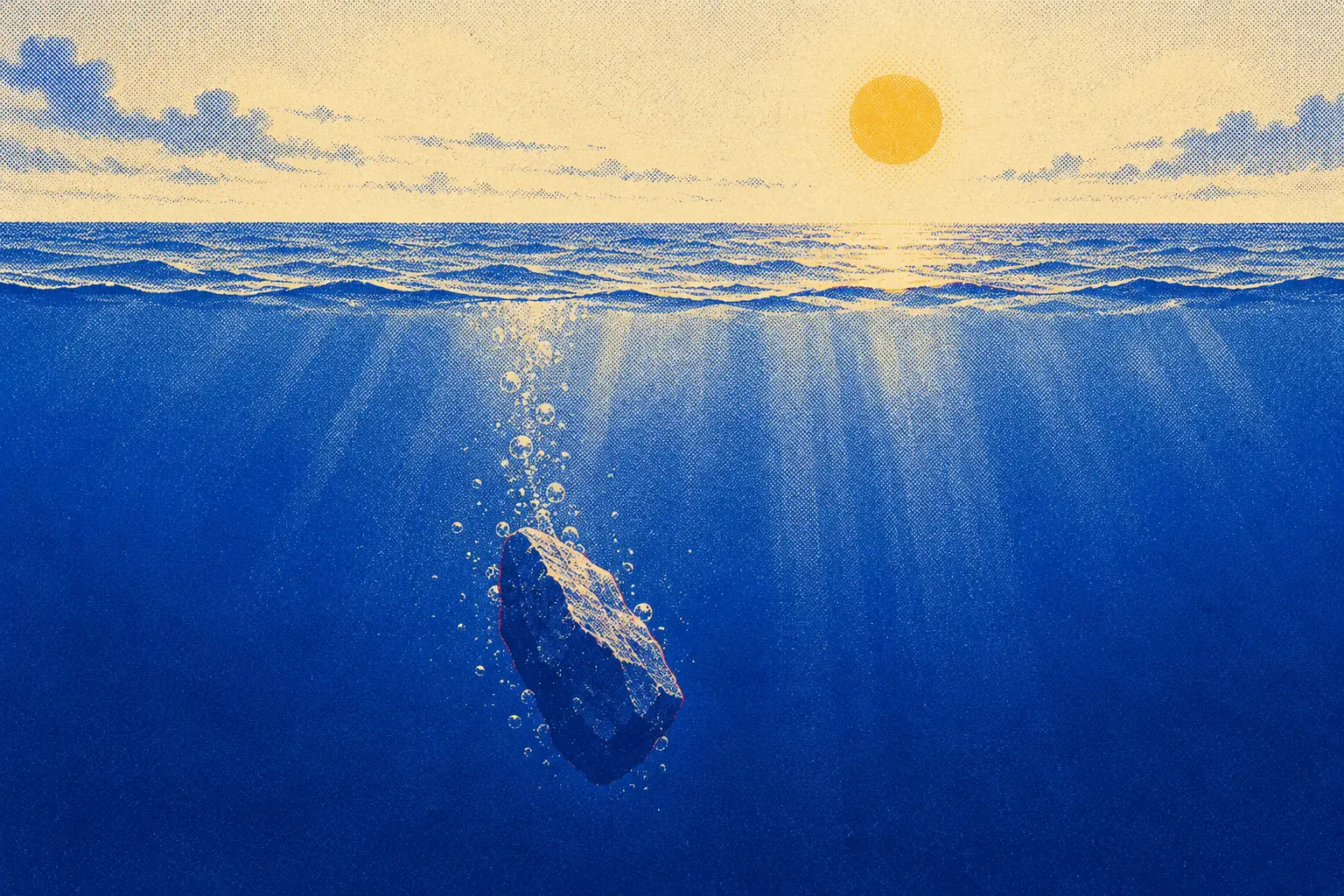 A rough stone sinks through deep blue water, trailing bubbles, while the sun shines on the surface far above.